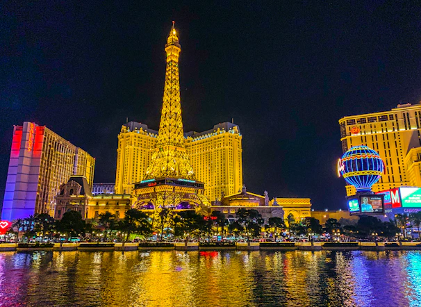 A sleek nighttime cityscape of Paris with the Eiffel Tower illuminated, symbolizing opportunity and prestige.