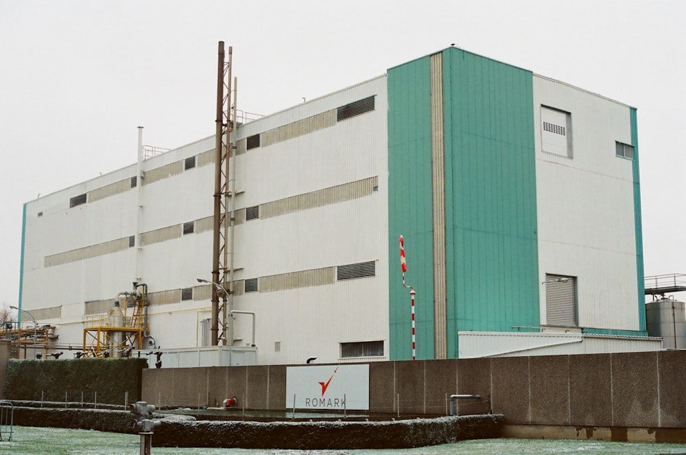 white and red concrete building during daytime