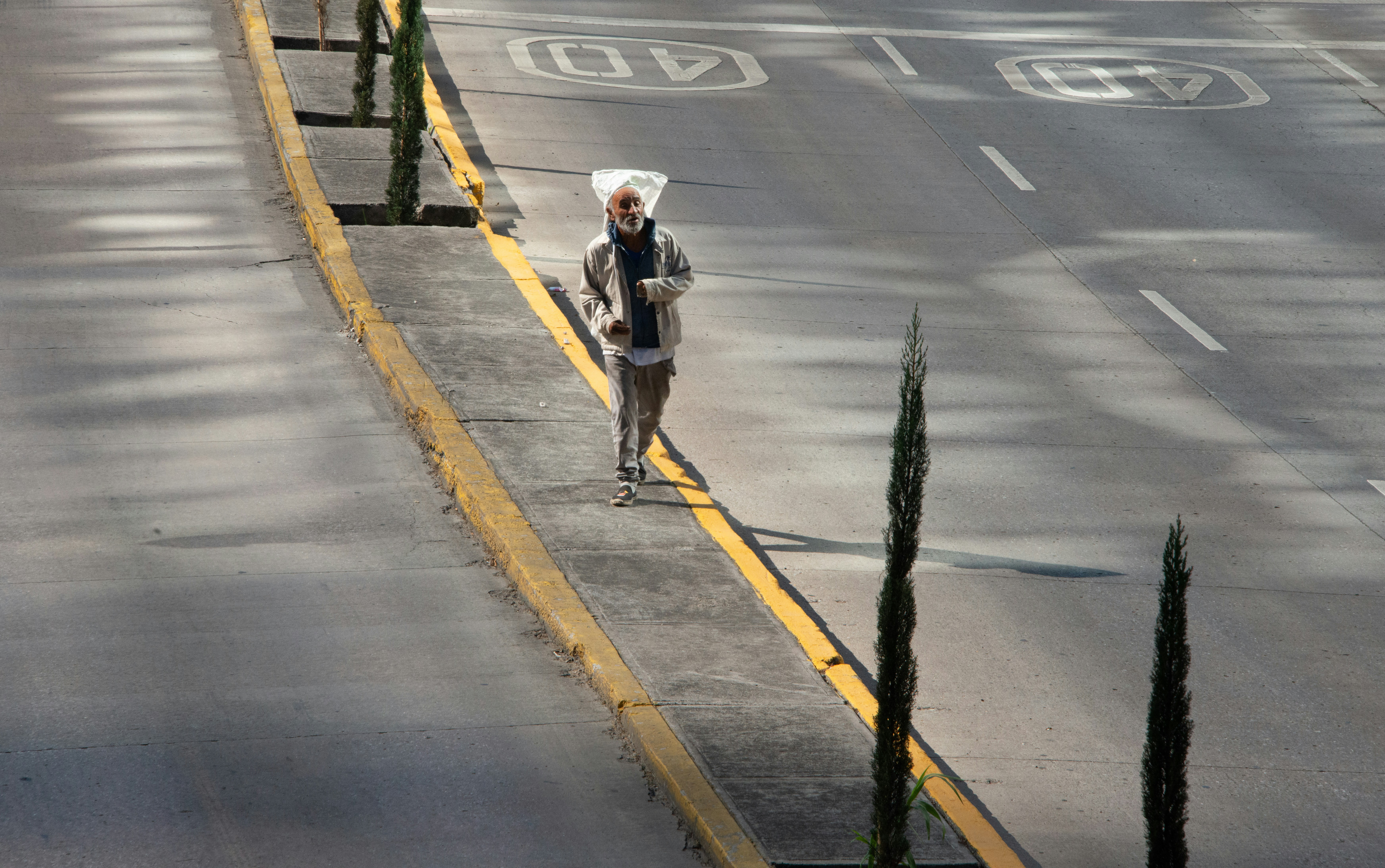 Man in black jacket walking
