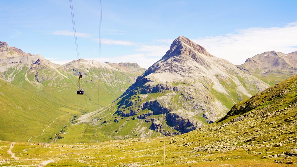 green and brown mountain under blue sky during daytime