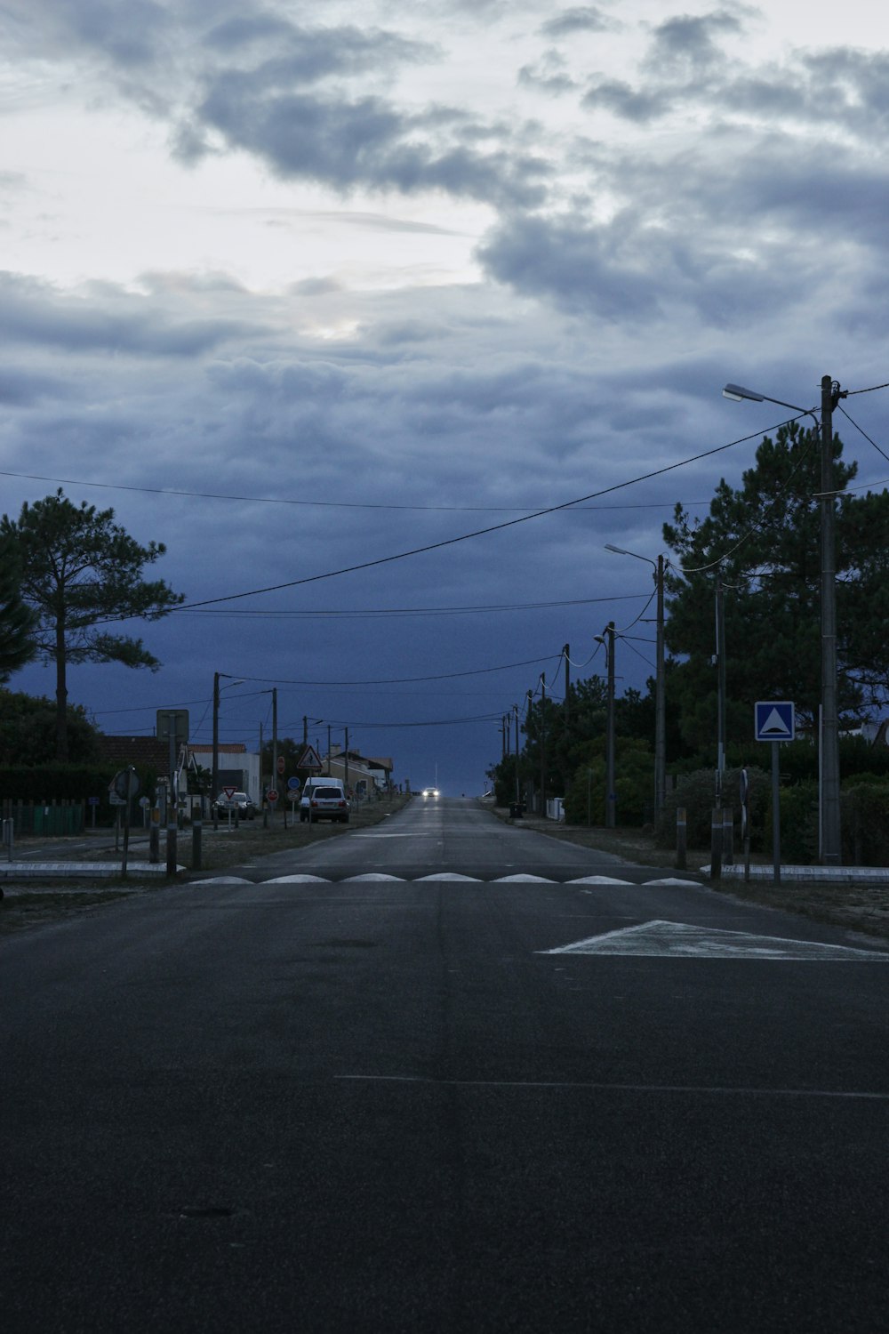 gray concrete road under gray cloudy sky