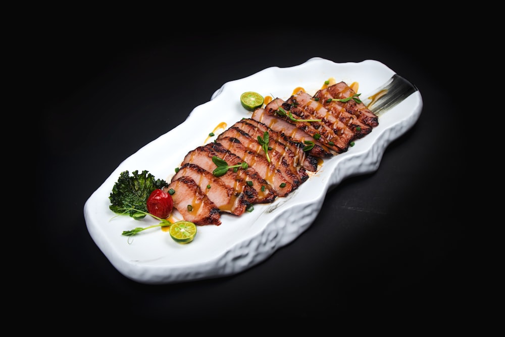 grilled meat on white ceramic plate