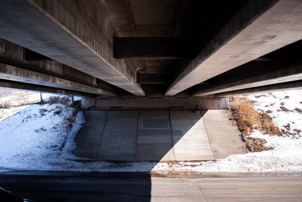 gray concrete bridge over blue water