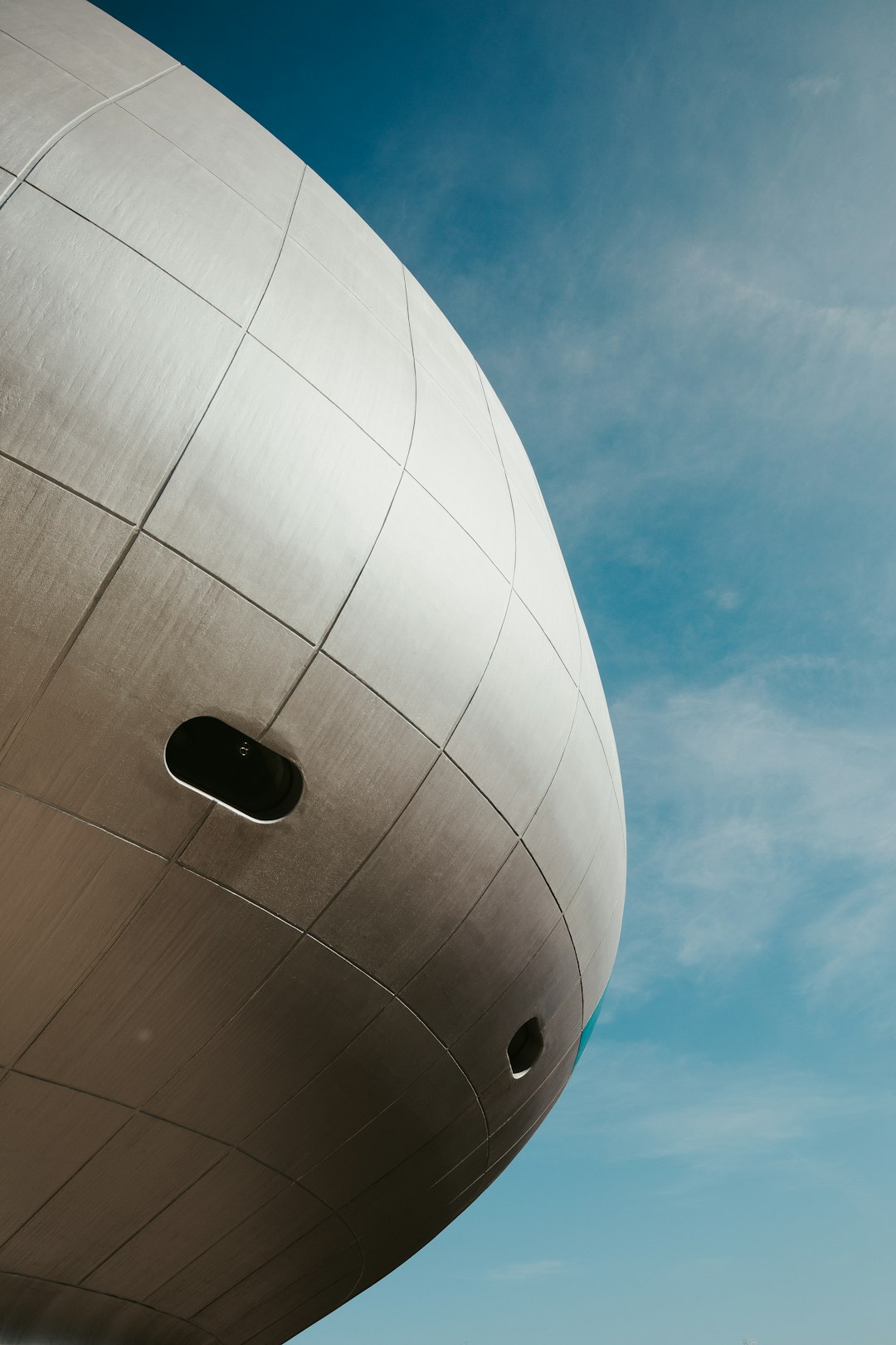 white round balloon under blue sky during daytime