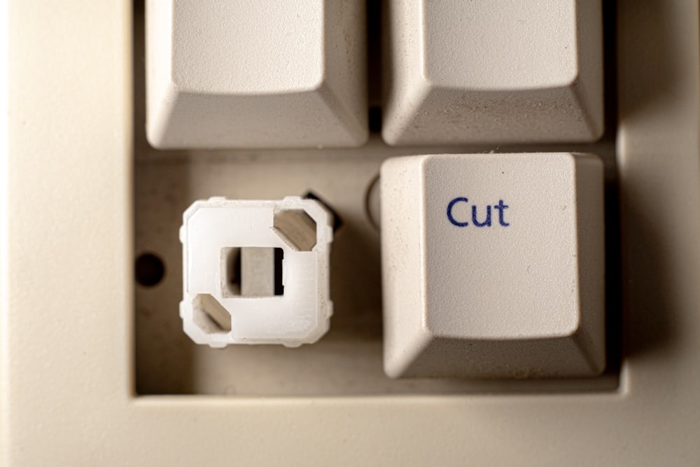 white computer keyboard showing white button