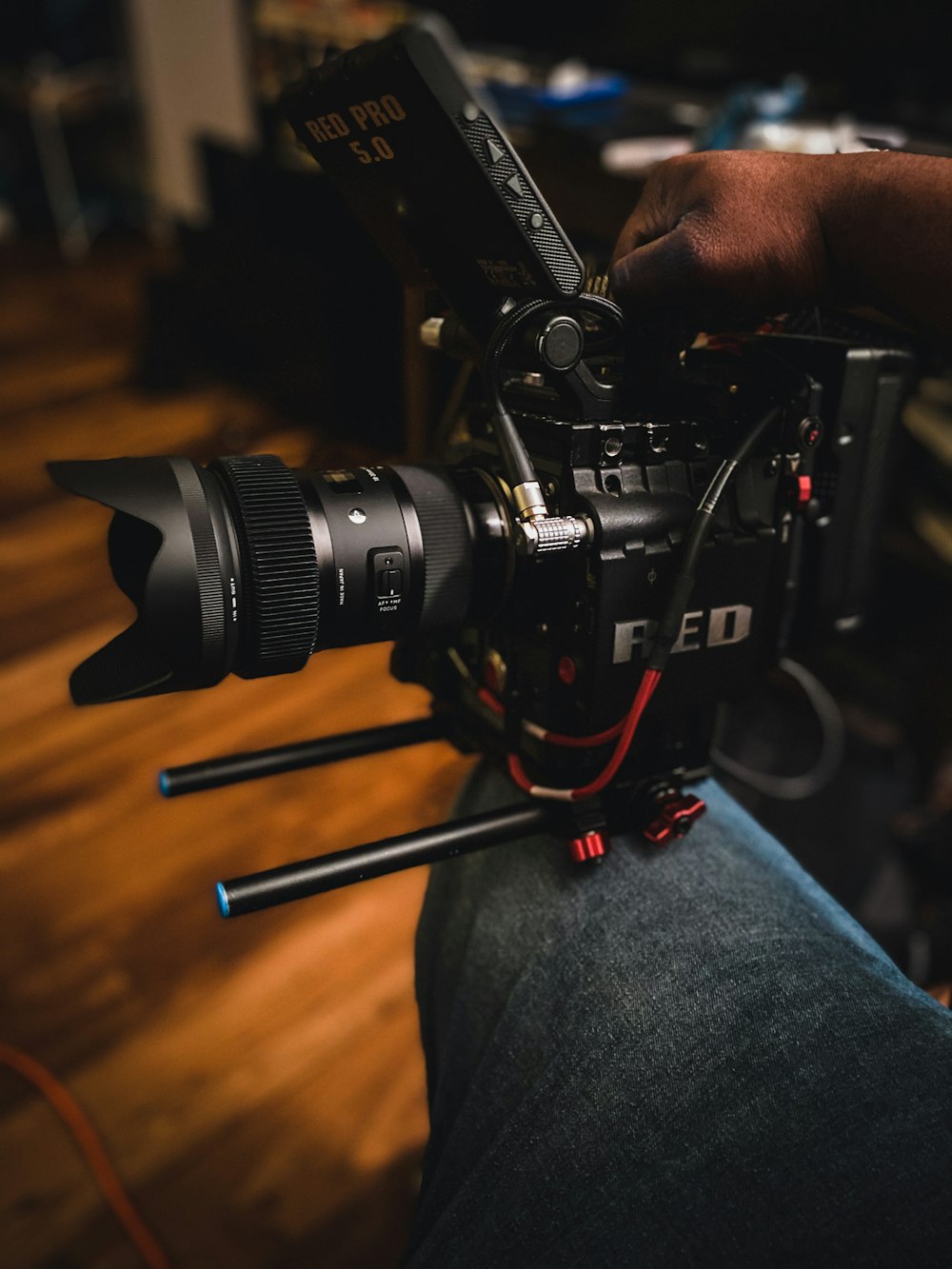 black nikon dslr camera on persons hand