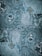 The image features a detailed close-up view of marble or stone tiles with intricate swirling patterns in shades of blue and gray. The tiles are arranged in a symmetrical pattern, creating a visually pleasing and consistent design.