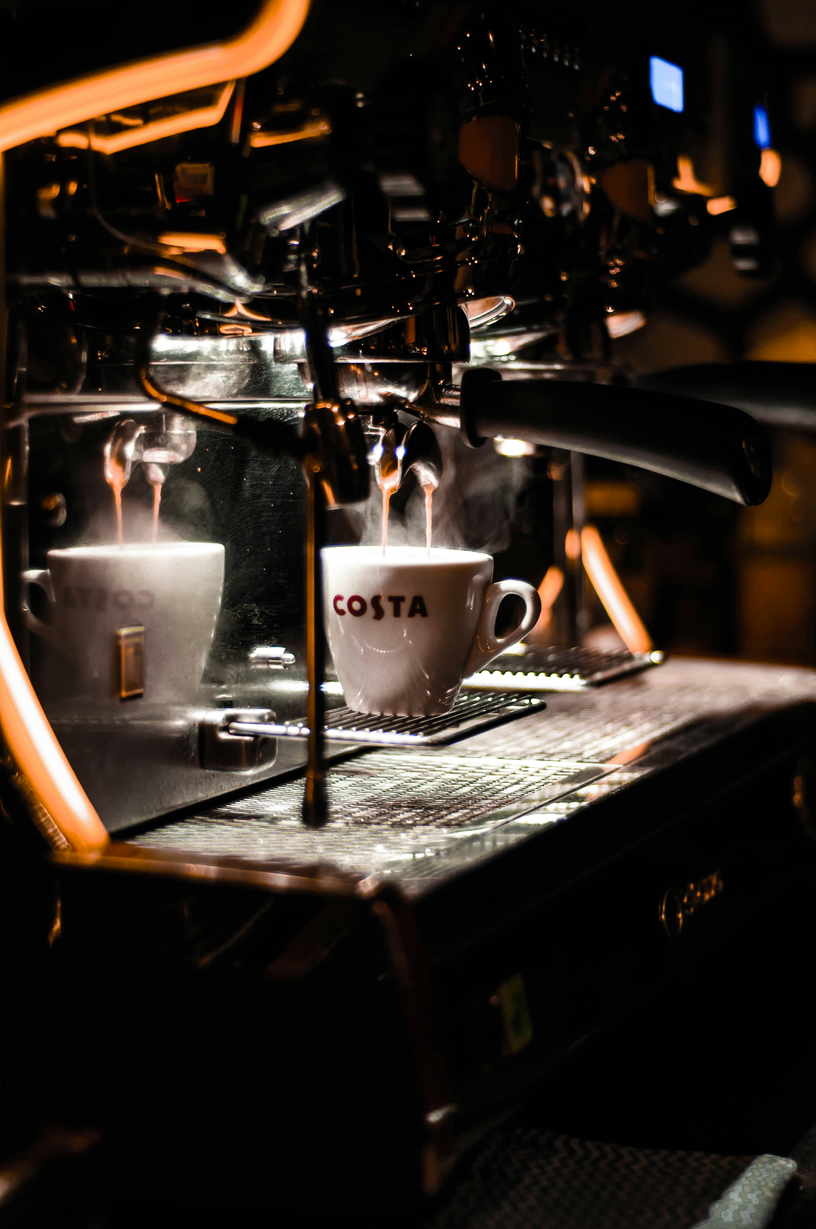 white ceramic mug on black table