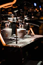 white ceramic mug on black table