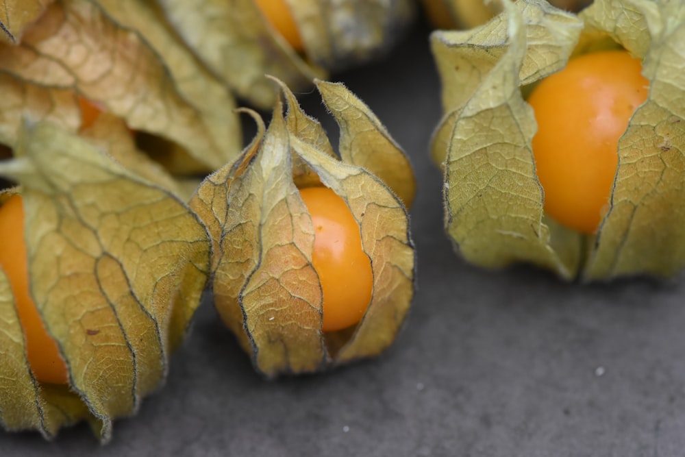 orange fruit on black textile