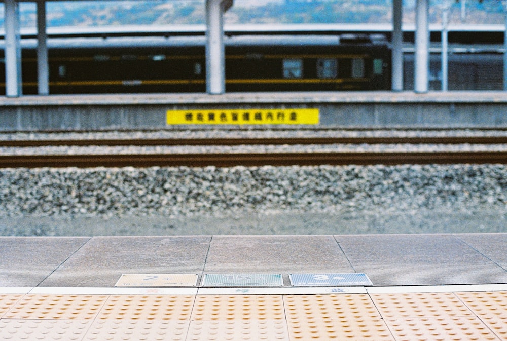 yellow and black train rail