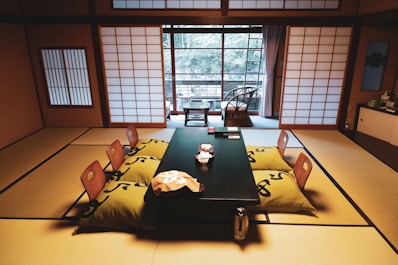 black wooden table with chairs