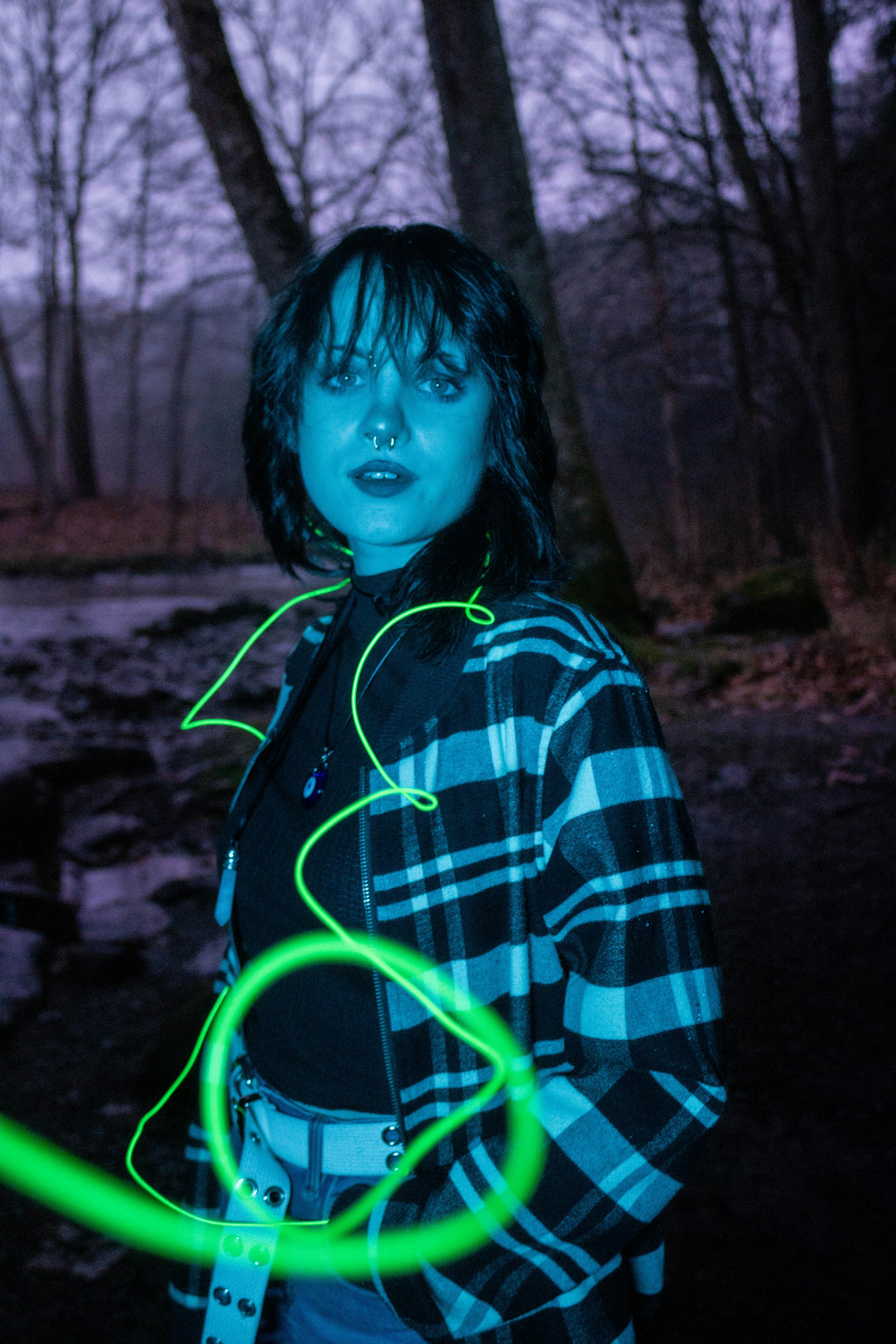 girl in green and black plaid dress shirt