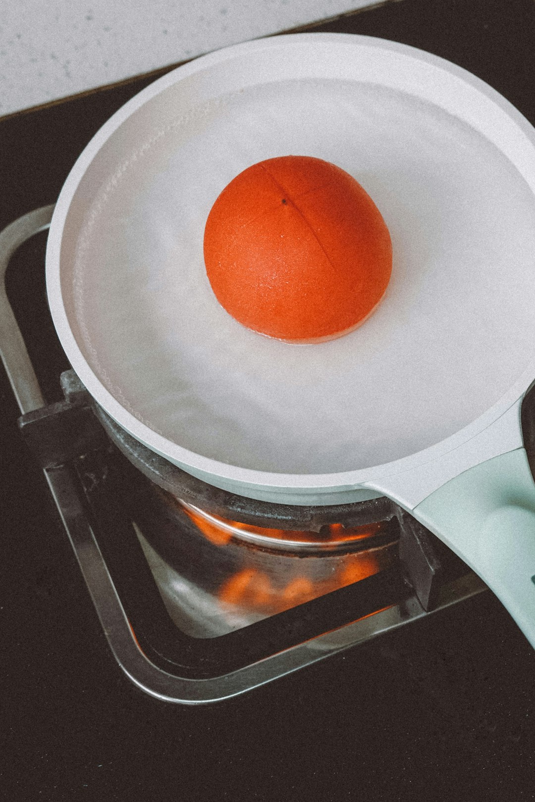 egg on white cooking pan