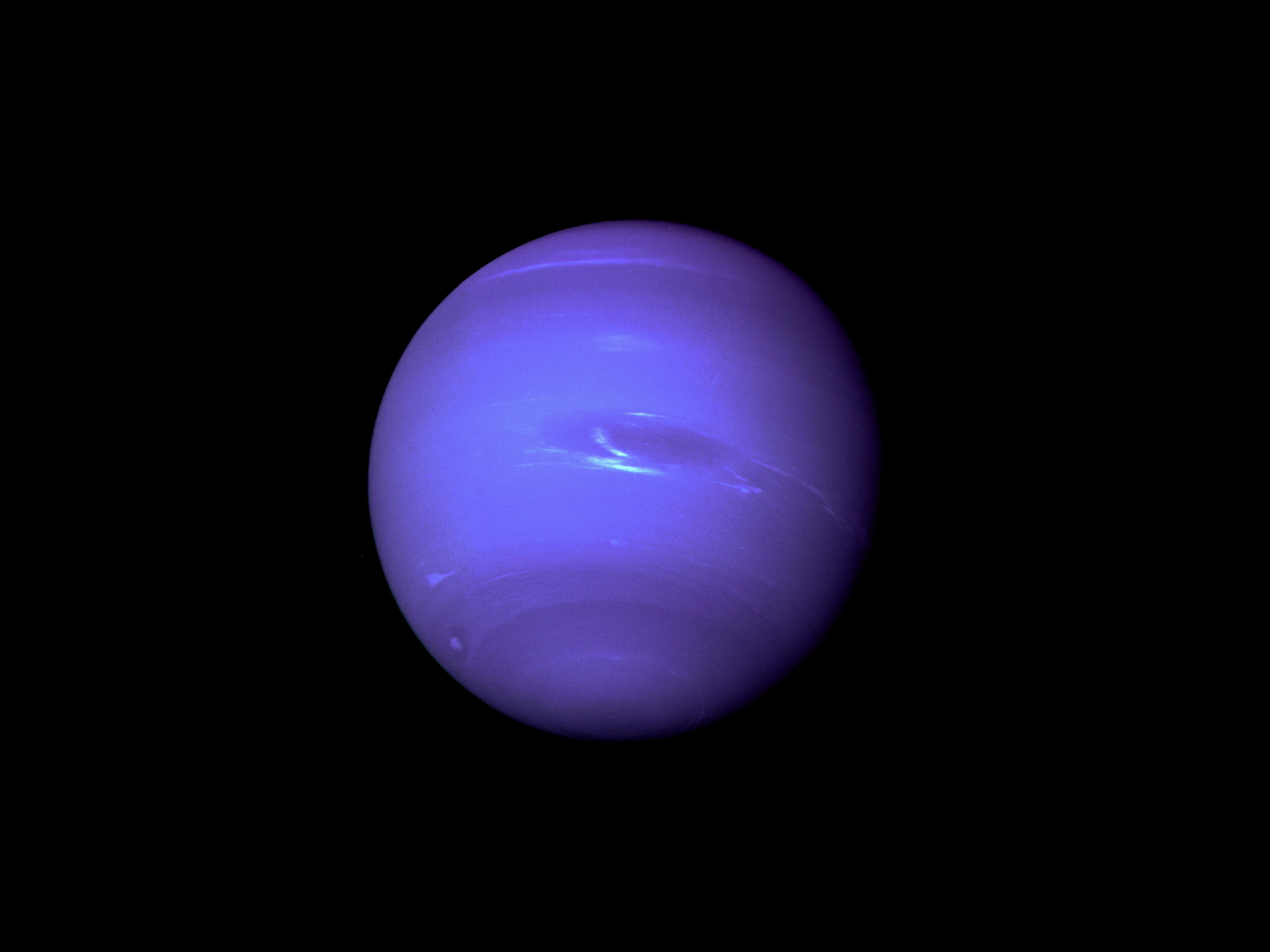 The planet Neptune as a deep blue sphere with white cloud bands against black space