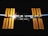 The image features the International Space Station (ISS) suspended against the backdrop of space. The solar panels are glowing a bright orange color, illuminated by the Sun's rays. A thin line of Earth's atmosphere is visible along the horizon, creating a stunning contrast between the stark darkness of space and the vibrant colors of the station and the Earth.