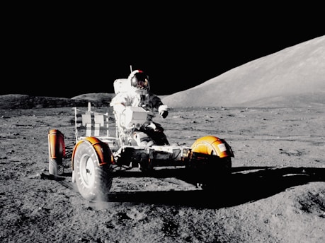 Astronaut on lunar rover space probes