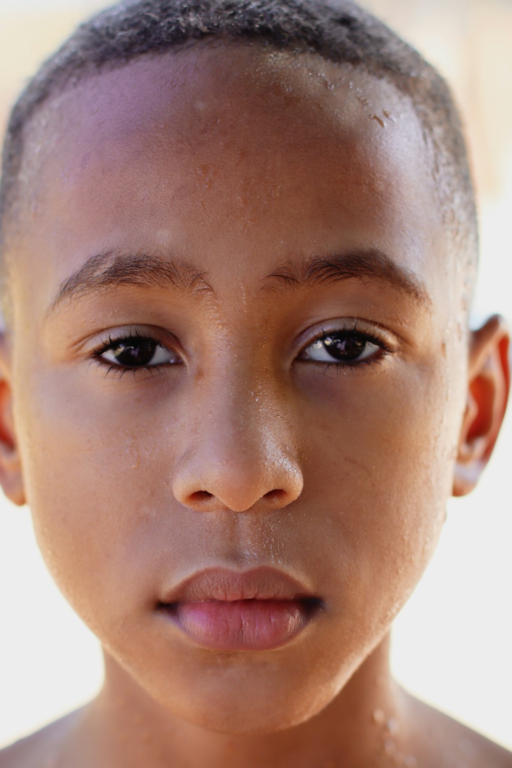 boy in white crew neck shirt