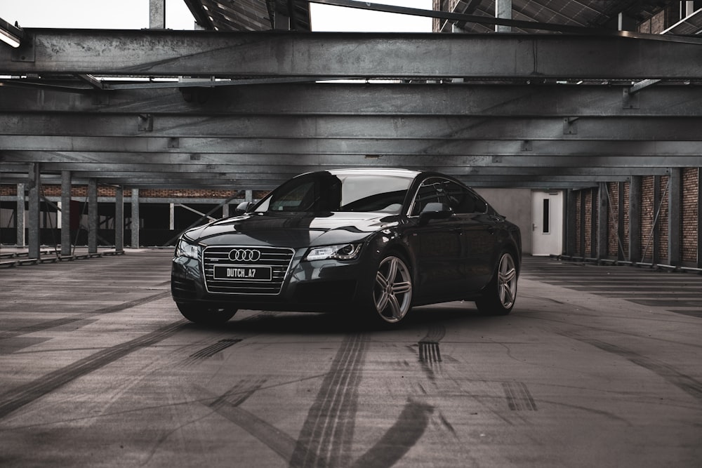 black bmw m 3 coupe parked in garage