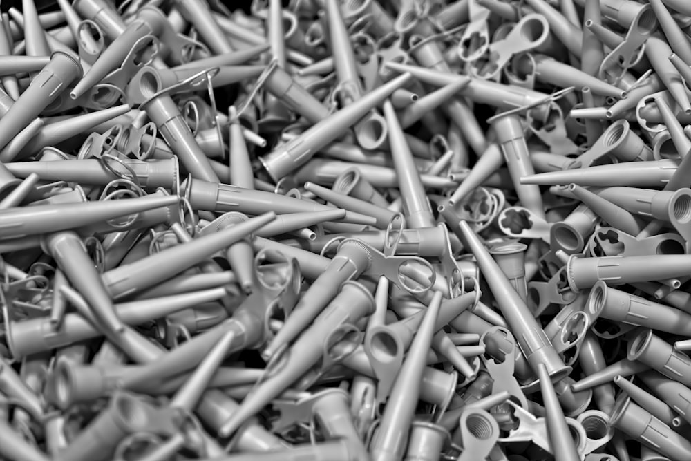 a pile of metal objects are piled together