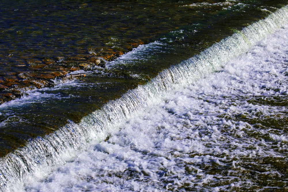 water waves hitting the shore