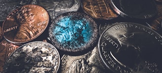 Close-up of a U.S. coin showing a doubled die mint error under soft lighting.