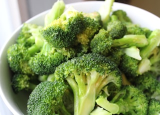 green broccoli on white ceramic plate