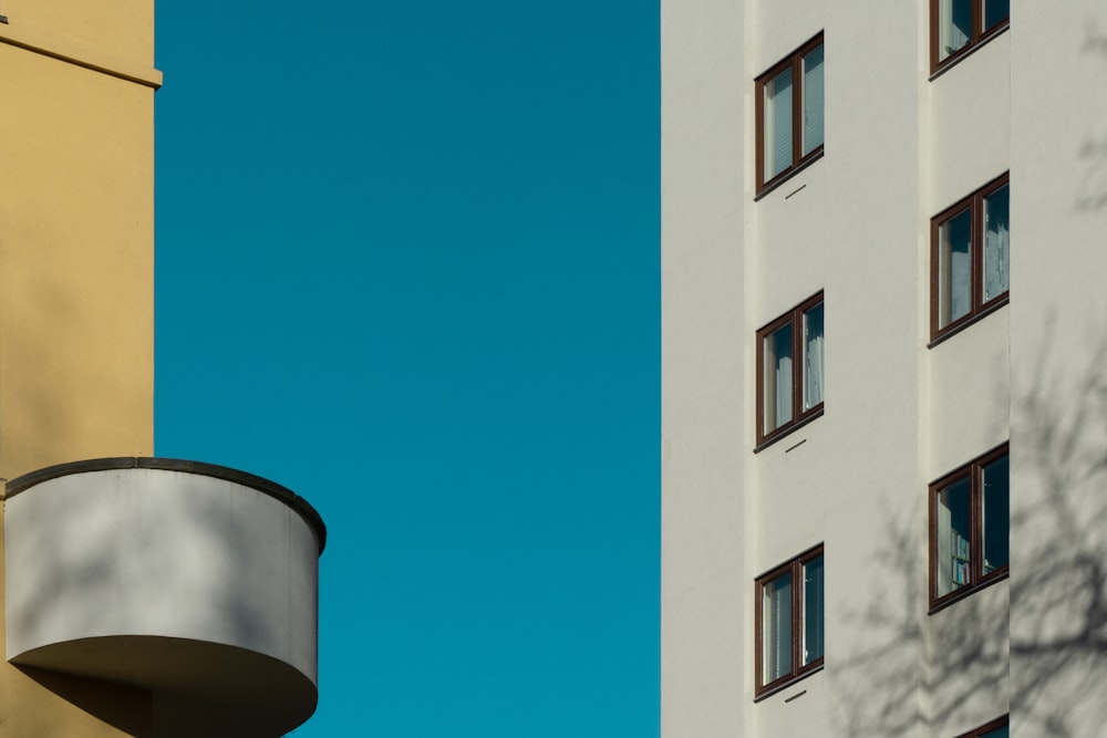 white concrete building under blue sky during daytime