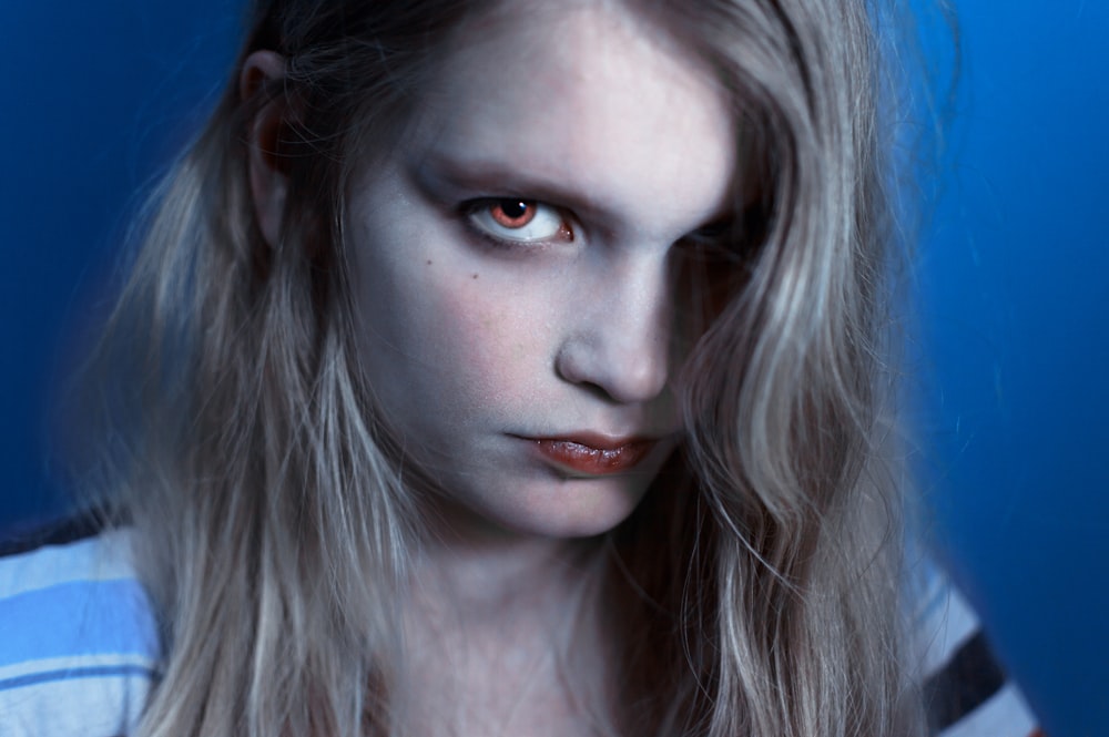 woman with brown hair and red lipstick