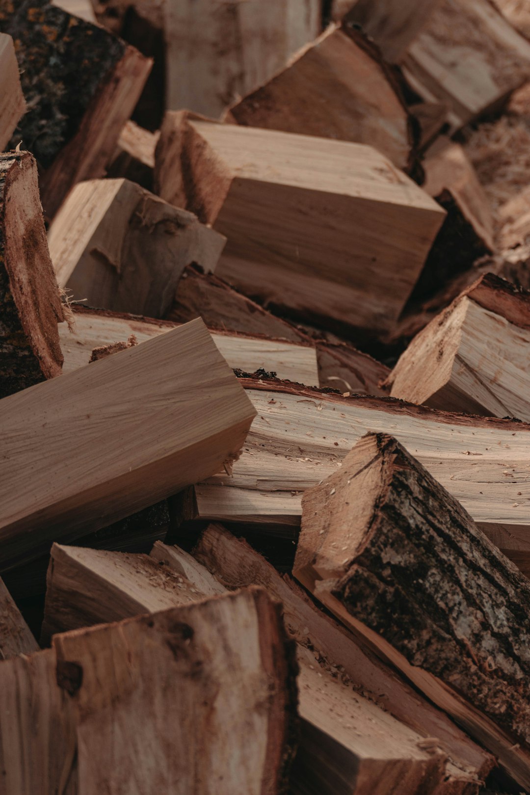 brown wooden log lot during daytime