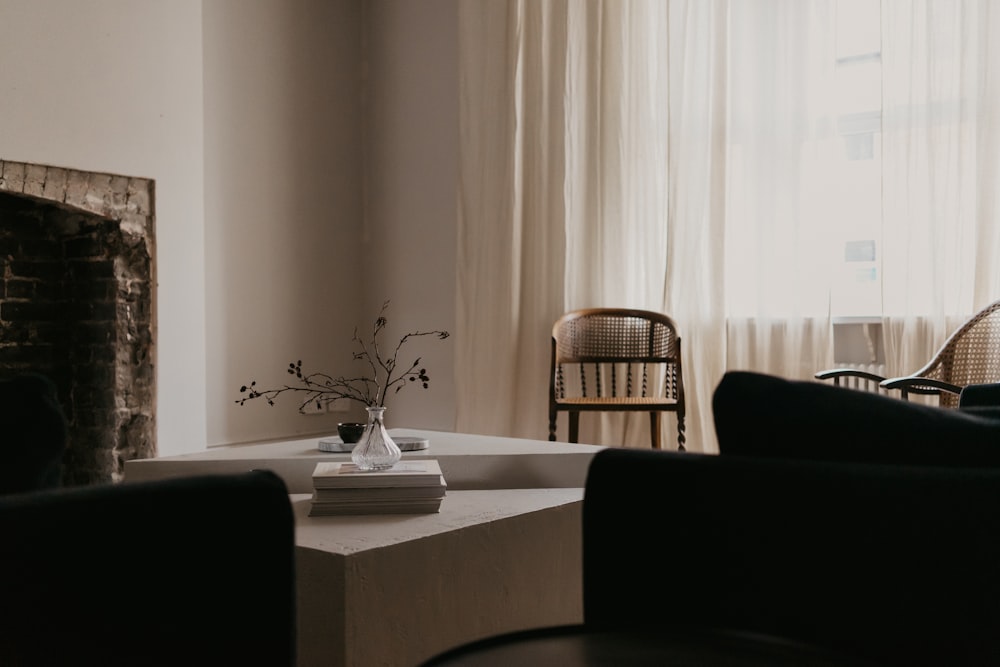 white ceramic mug on white table