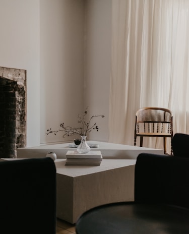 A beautifully arranged coffee table with minimalist decor and natural elements.
