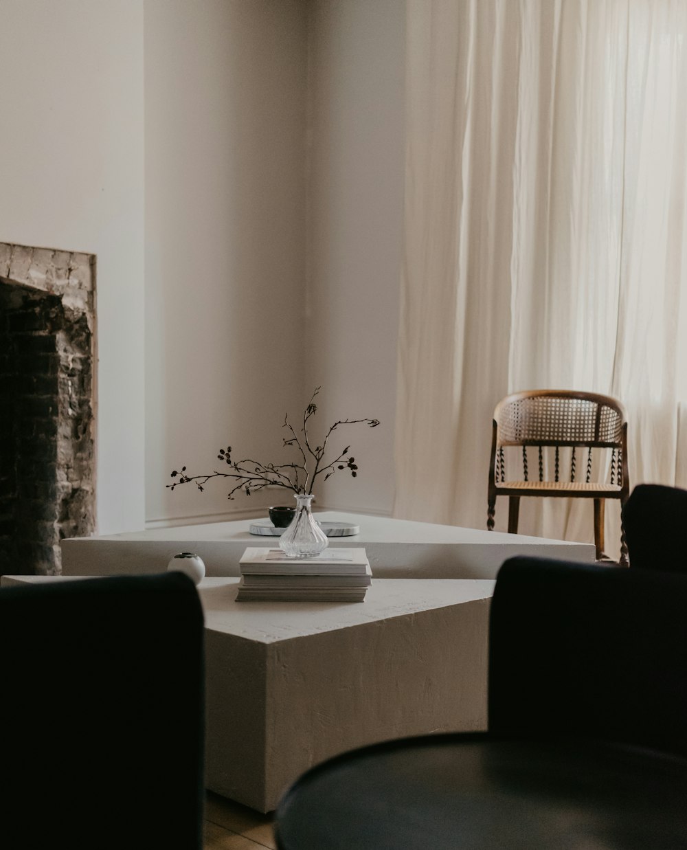 white ceramic plate on white table