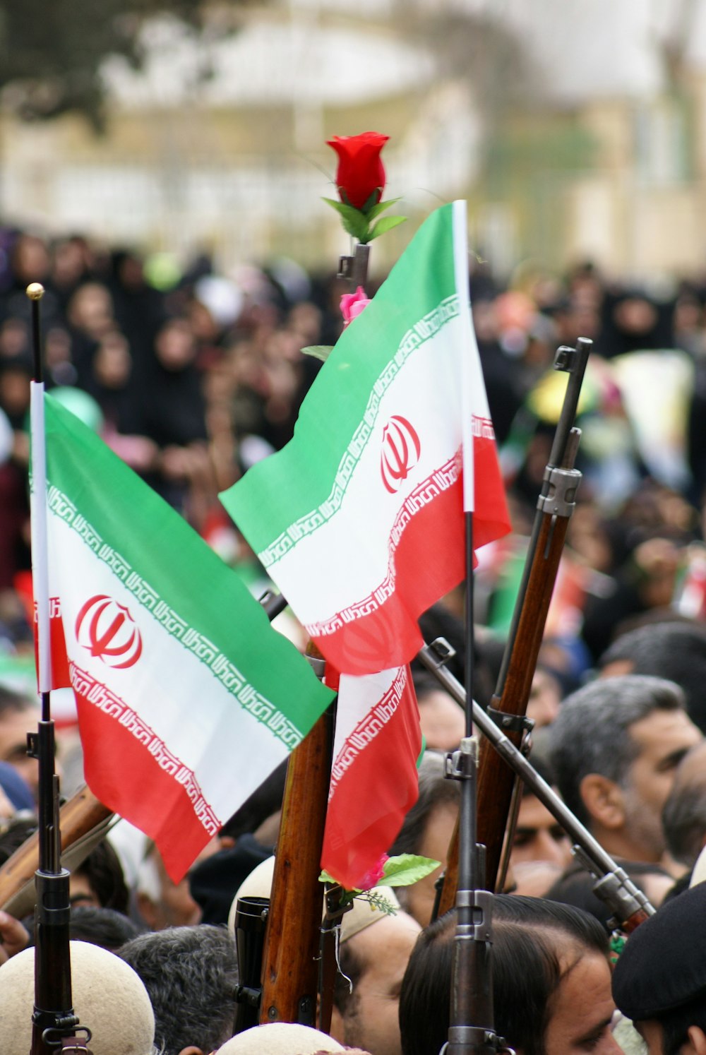 people holding flags during daytime