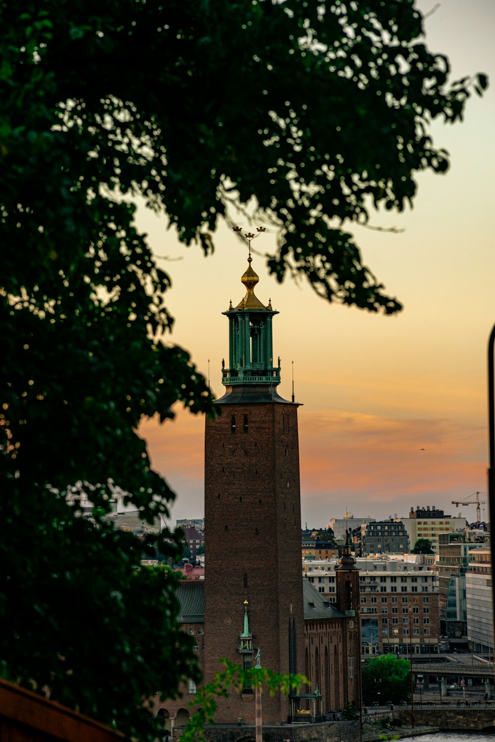 brown concrete tower during sunset