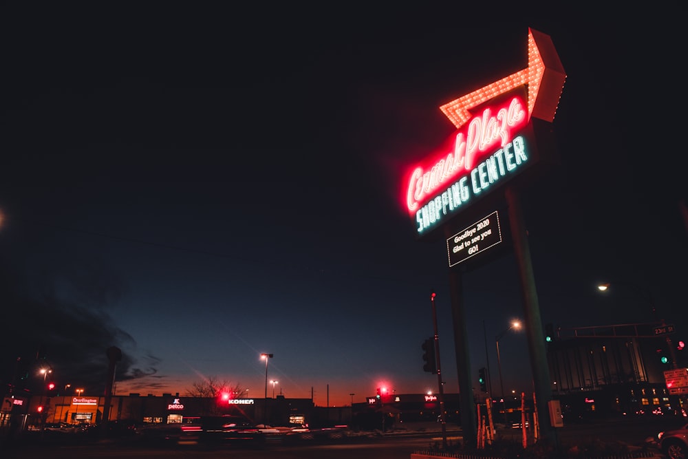 red and white UNKs building during night time