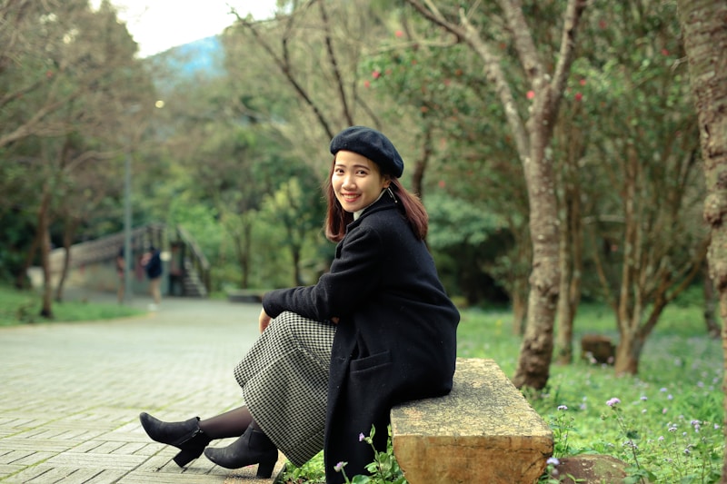 Relaxed woman on park bench