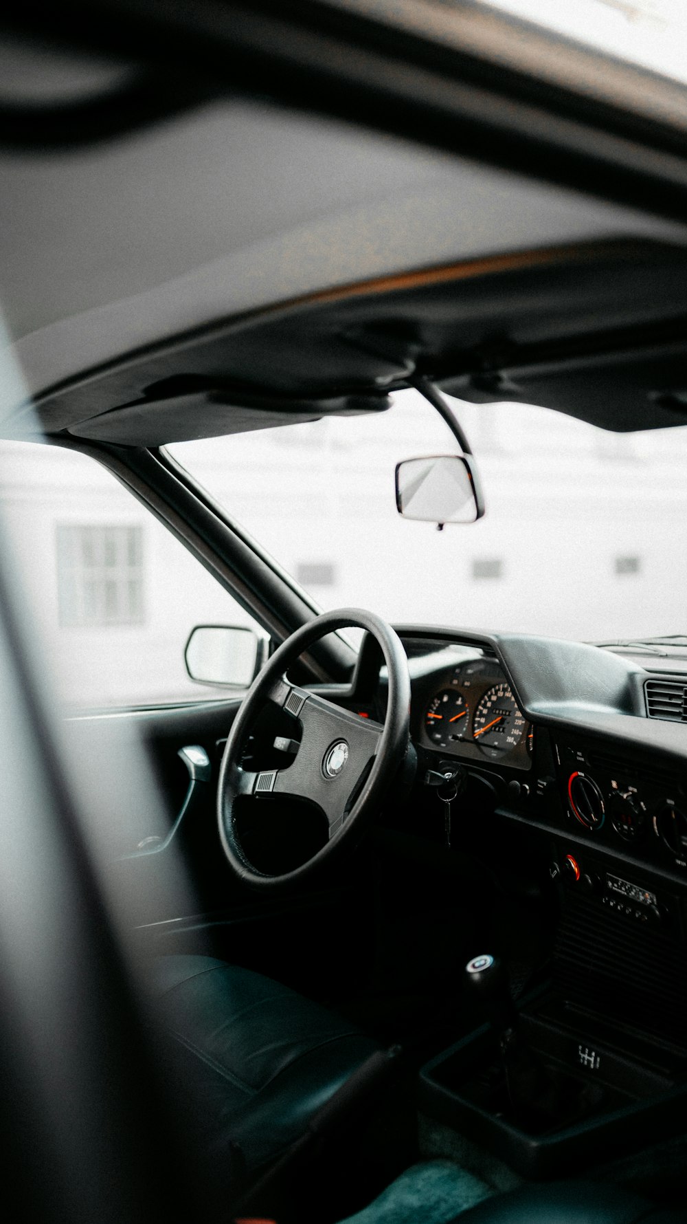 black car on road during daytime