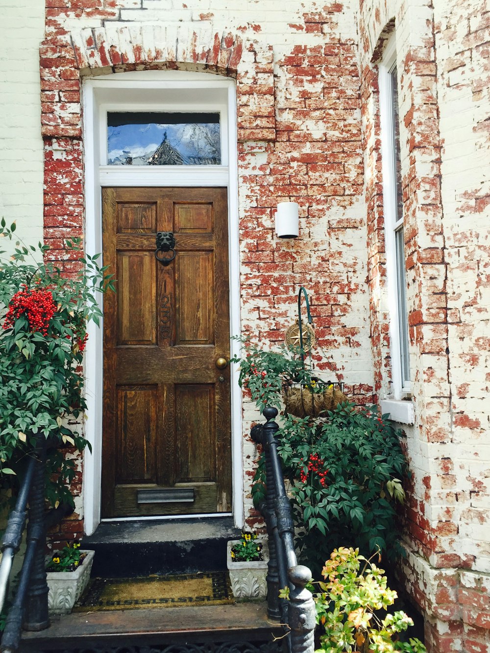 brown wooden door with white wooden frame