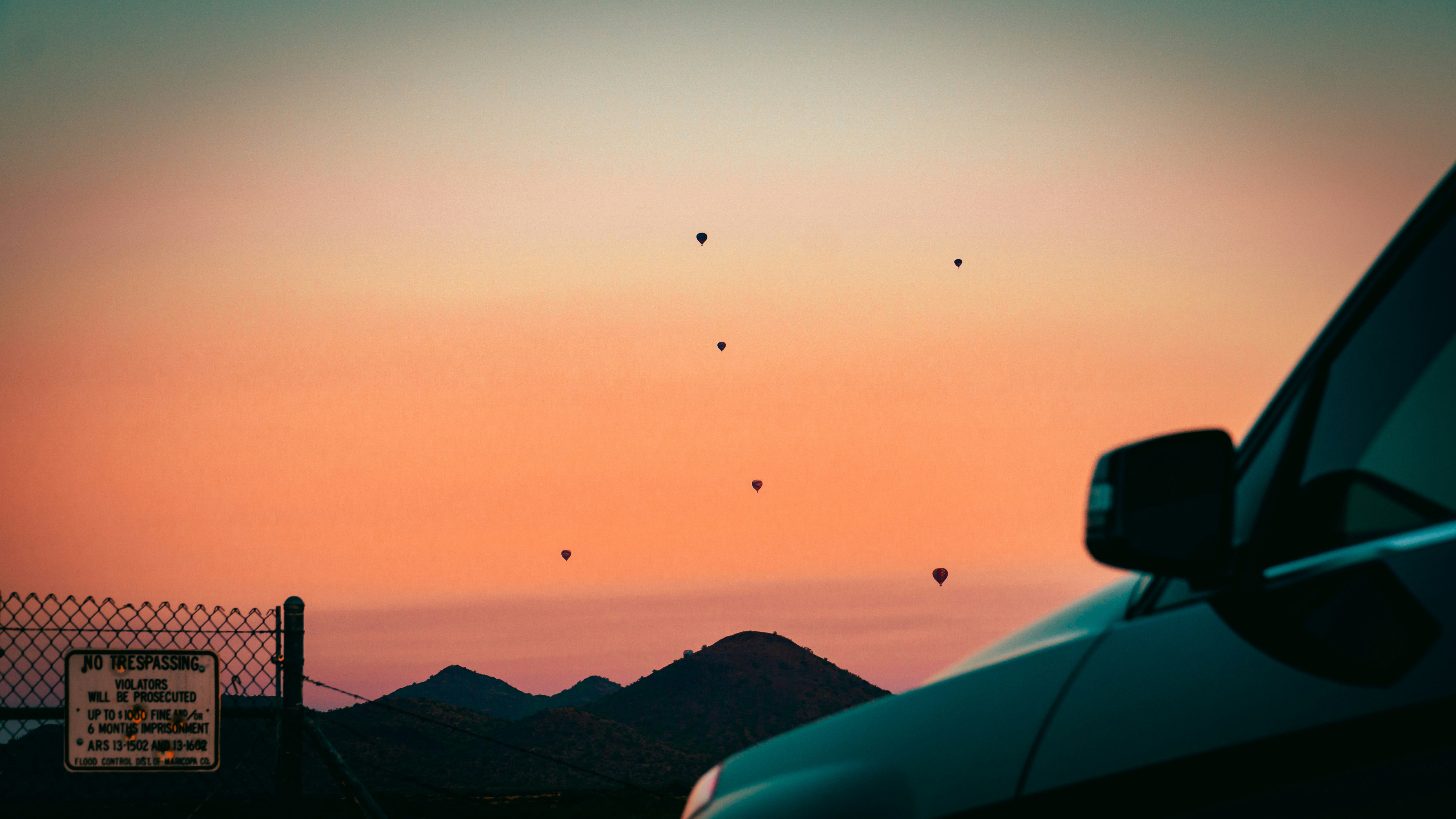 car on road near mountains during daytime
