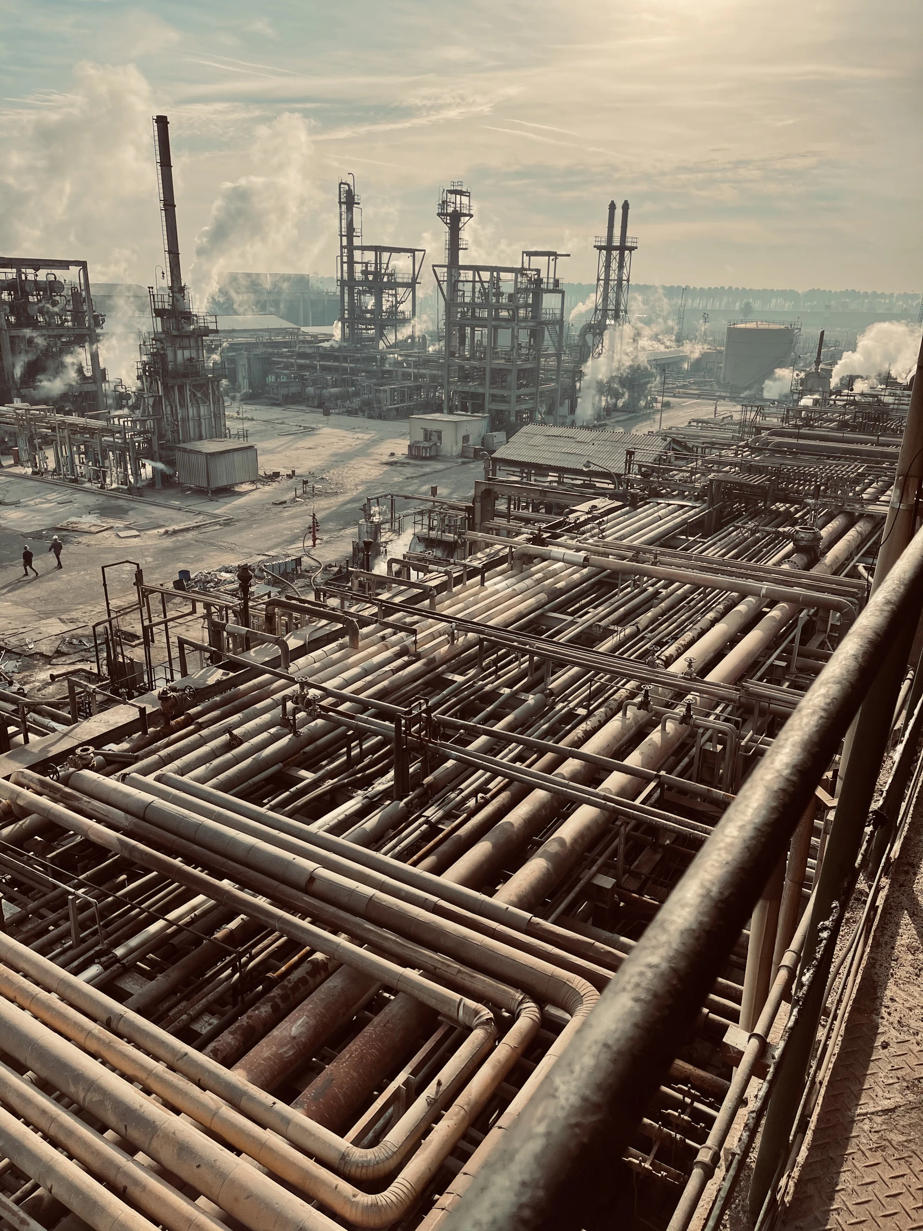Petrochemical processing equipment with metal pipework and industrial structures