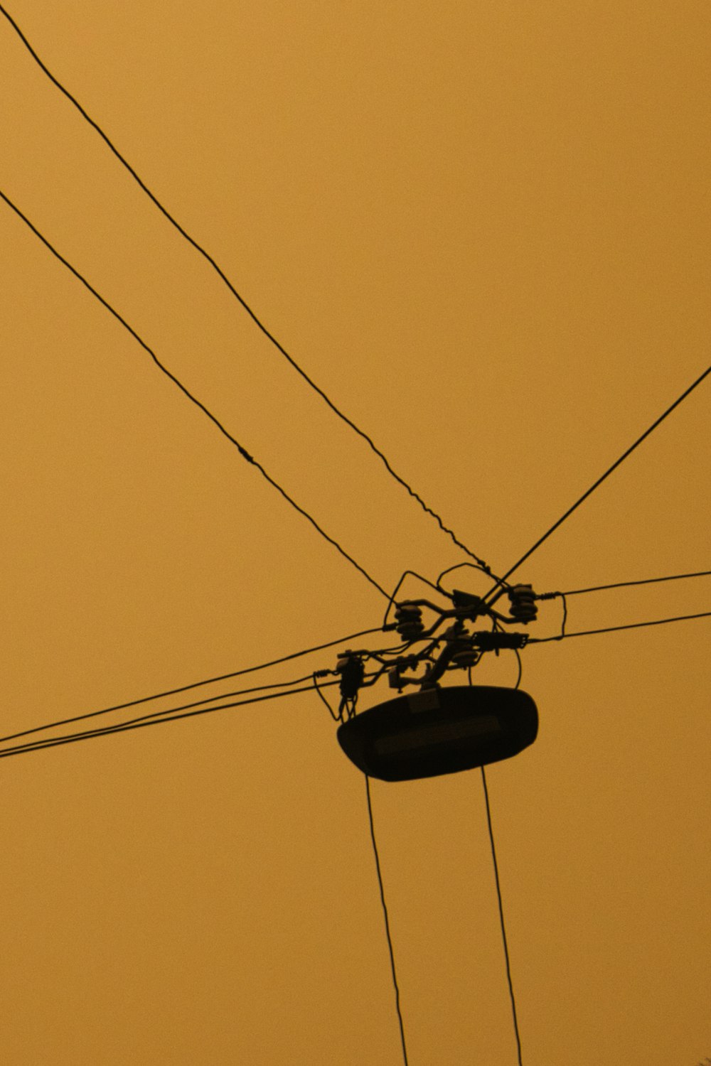 black cable car under blue sky during daytime