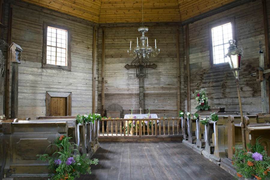 Warm timber interior of the camp's rustic chapel