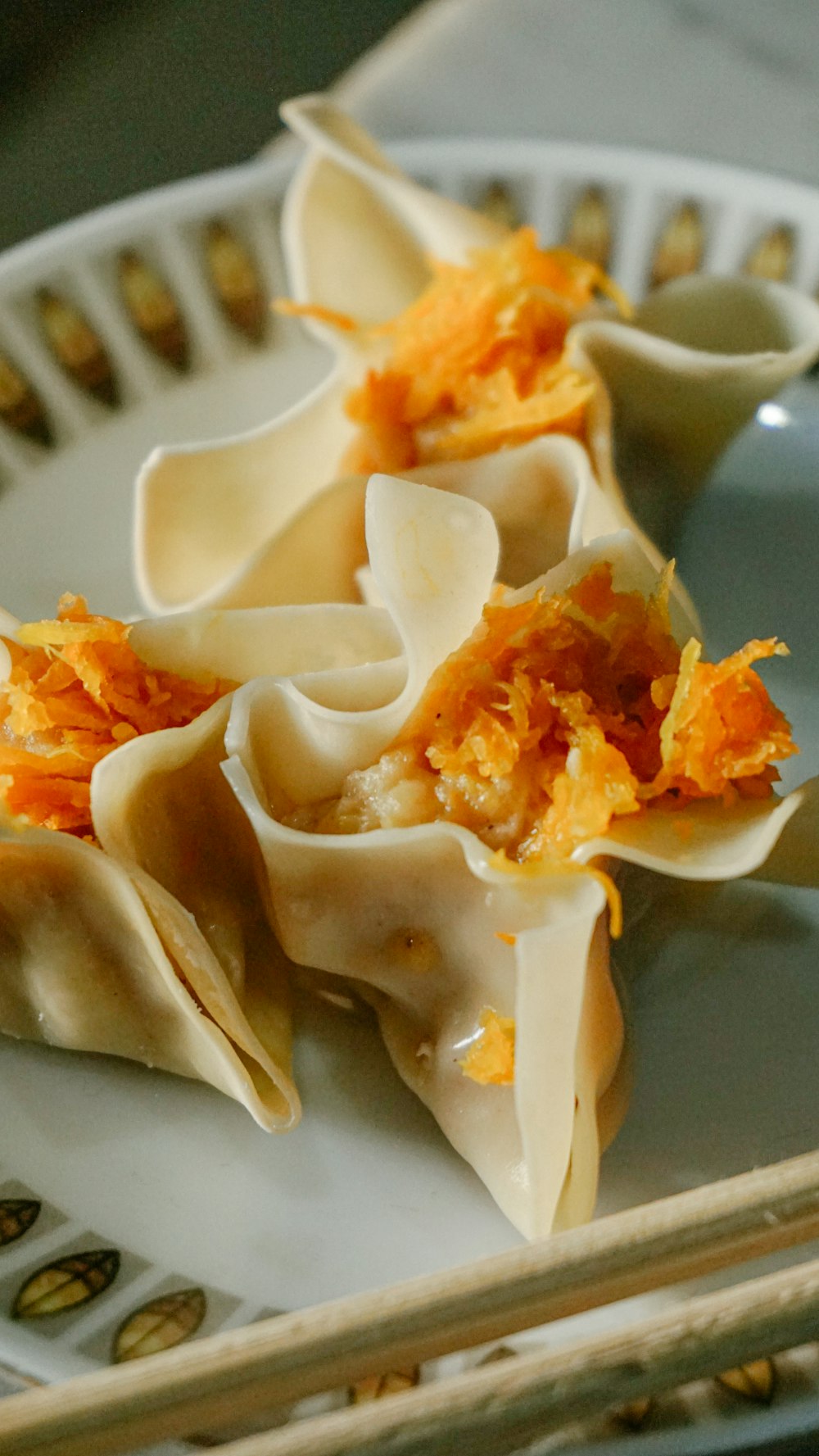 white and orange food on white ceramic plate