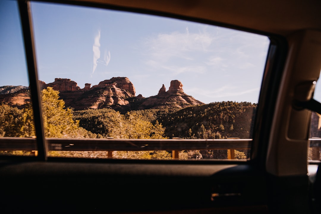 brown rock formation under blue sky during daytime