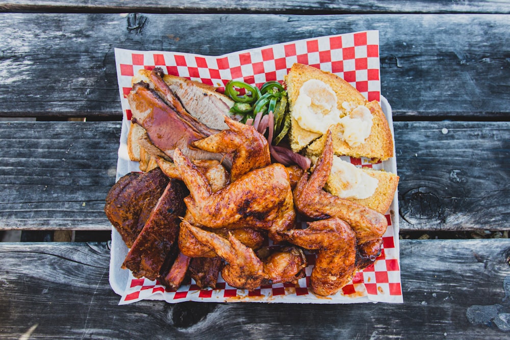 fried food on red and white checkered textile