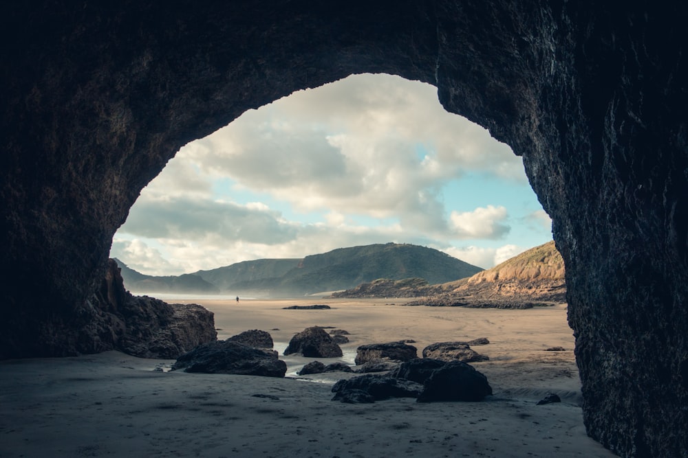 brown rock formation on sea shore during daytime