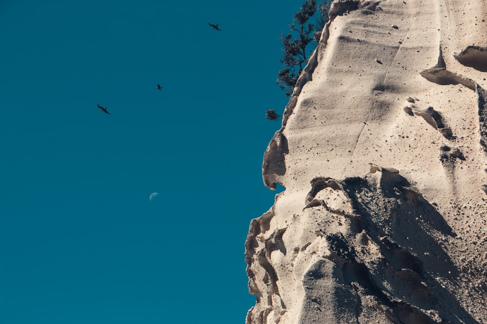 brown rock formation under blue sky during daytime