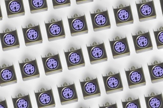 Stacked electronic connectors with the blue and dark gray color palette matching the branding.