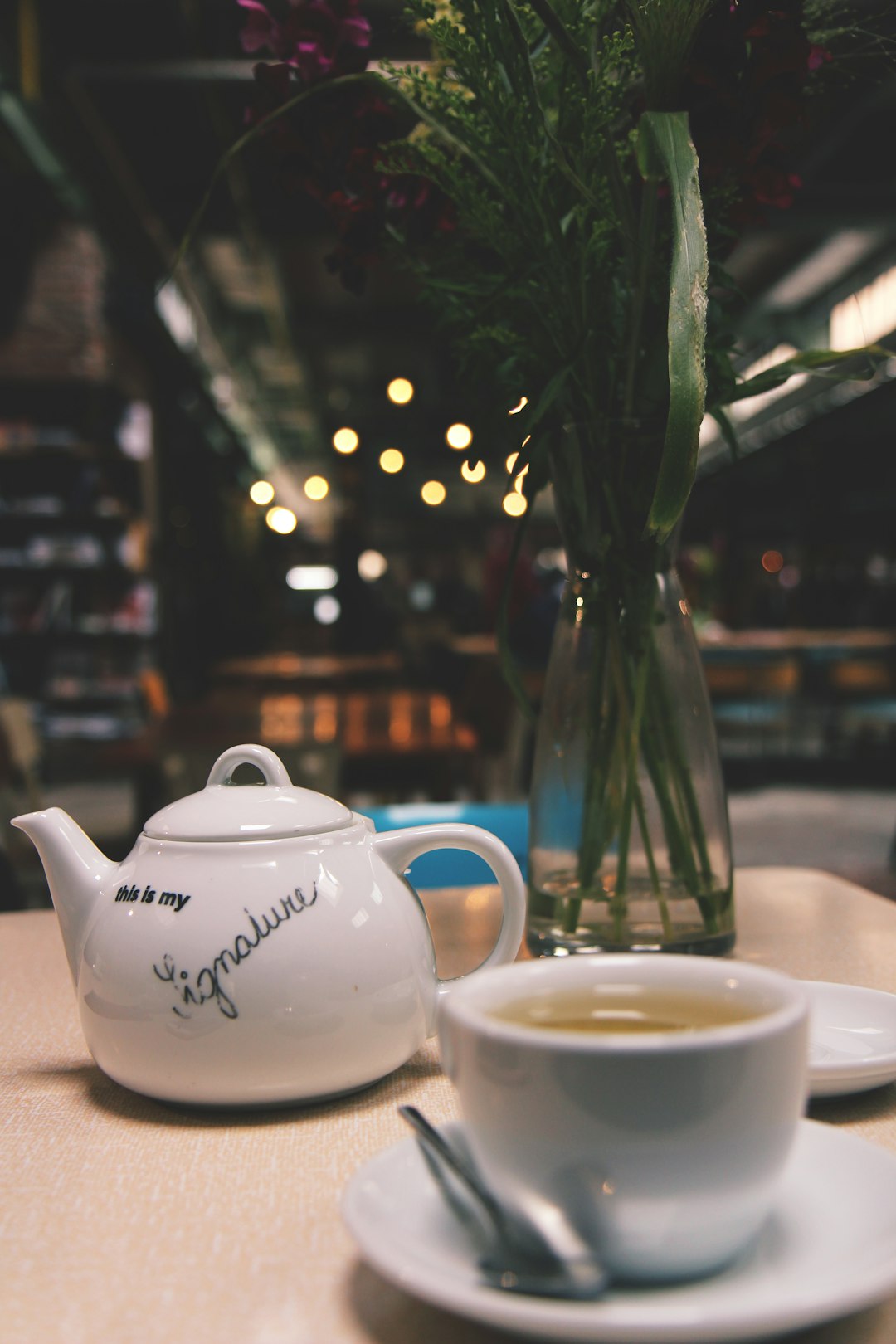 white ceramic teapot on table